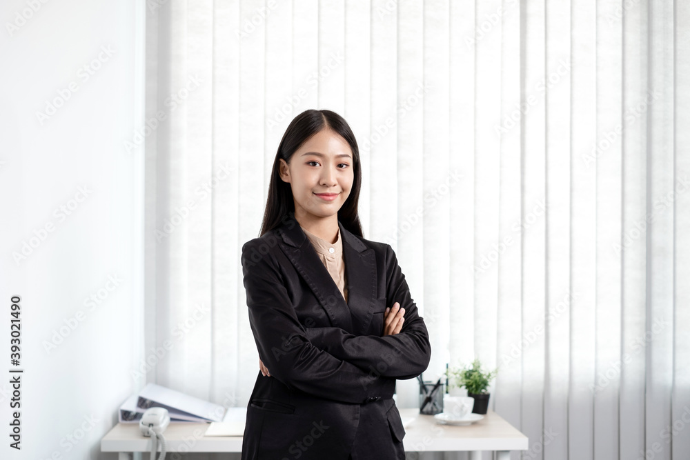 Asian businesswoman. stand happy smile the office Asian businesswoman. stand happy smile the office