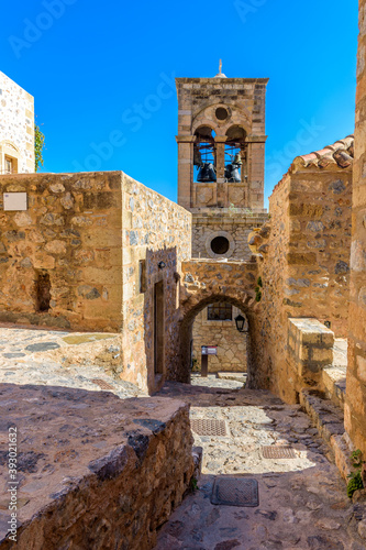 Traditional architecture with the bell tower of Elcomenos Christos in the main square of the medieval castle of Monemvasia, Lakonia, Peloponnese, Greece