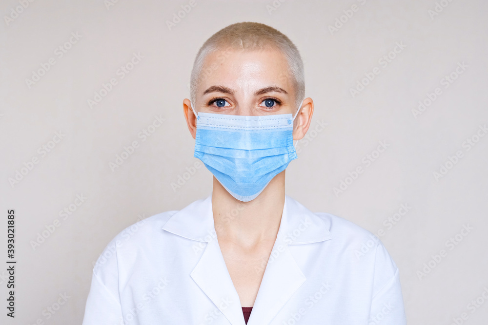 Doctor in a medical mask and protective suit against coronavirus infection. Doctor in a medical mask and protective suit against coronavirus infection.