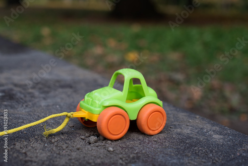 colourful toy car on the road