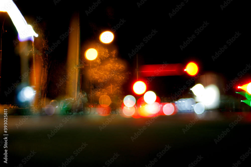 blurry traffic light in the city