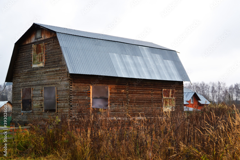 Abandoned old wooden house in Russian village Abandoned old wooden house in Russian village