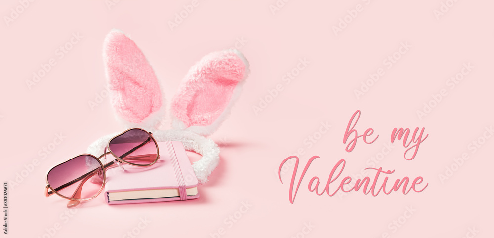 Be my Valentine card with pink bunny ears and heart shaped pink sunglasses. Sexy fantasies fancy dress. St Valentines and love concept
