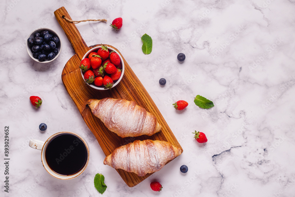 Breakfast with croissants and fresh fruits. Breakfast with croissants and fresh fruits.