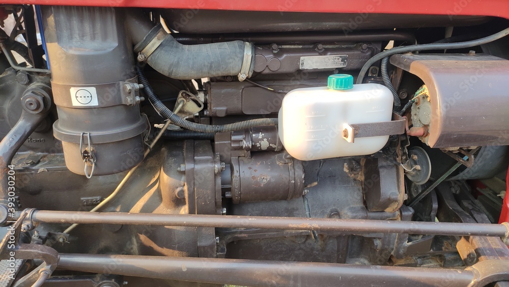 Tractor engine and control system, close up view Tractor engine and control system, close up view