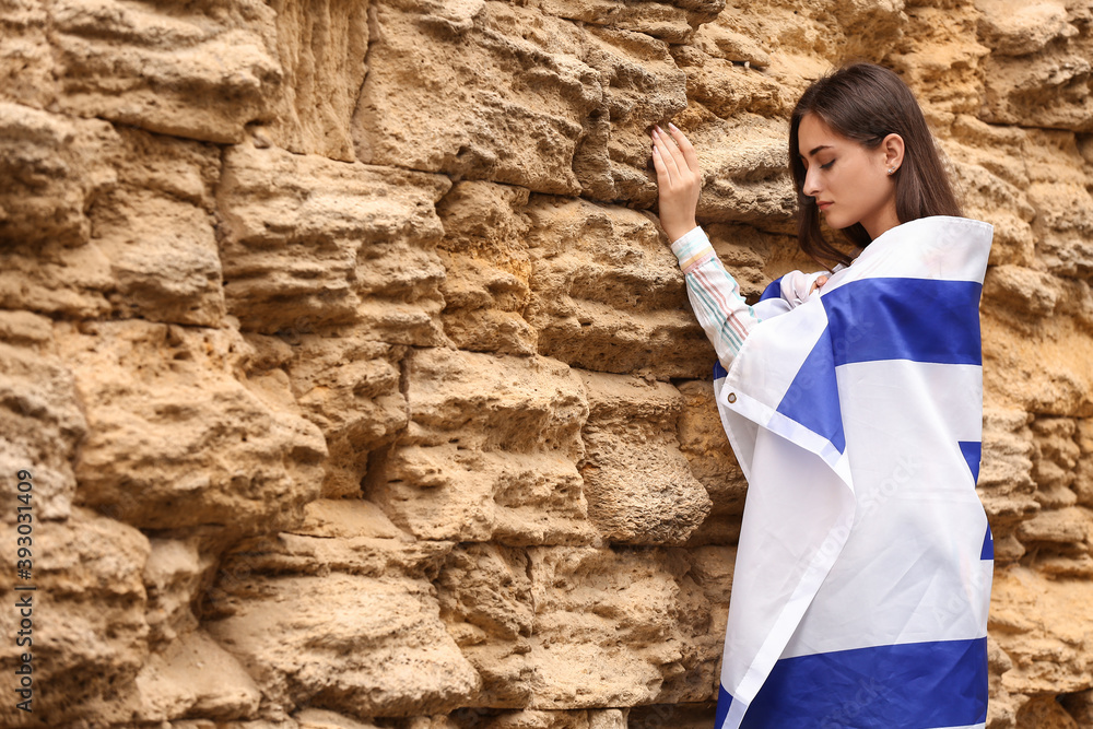 Φωτογραφία Woman with the flag of Israel near the Wailing Wall