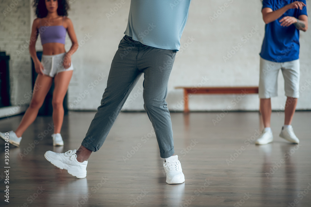 People learning new dance movements during the choreography class