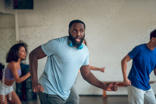 Man acquiring dancing skills in the dance school