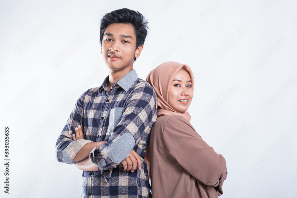 Portrait of Happy College Friends crossed arms on an isolated white Portrait of Happy College Friends crossed arms on an isolated white