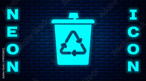 Glowing neon Recycle bin with recycle symbol icon isolated on brick wall background. Trash can icon. Garbage bin sign. Recycle basket sign. Vector.
