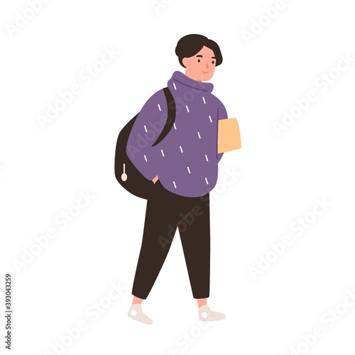 Happy boy go to school and carrying book or tablet. Portrait of smiling schoolboy with backpack. Flat vector cartoon illustration of male teenage pupil with schoolbag isolated on white