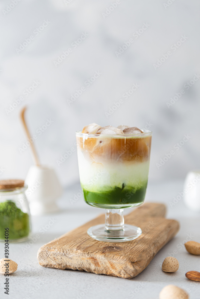 Matcha espresso. Trendy coffee drink with spirulina. Green tea coffee