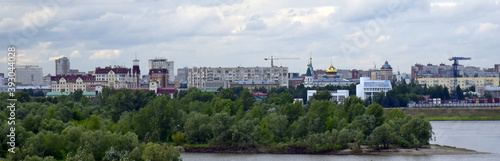 View of the embankment and the historical part of the city of Omsk in Russia from the Leningrad bridge on the Irtysh river-6