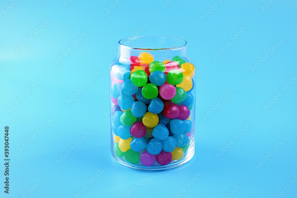 colourful candies in glass bottle colourful candies in glass bottle