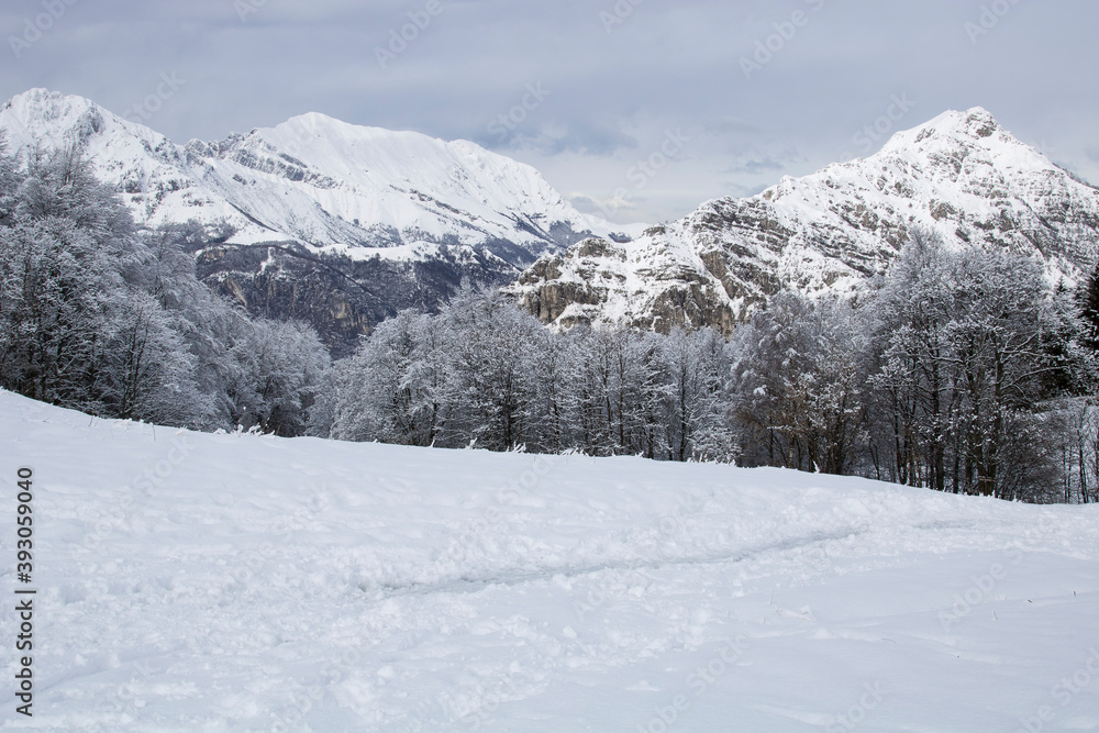 Winter.
Panoramic view of mountain with a lot of snow in Italy, Lombardy.