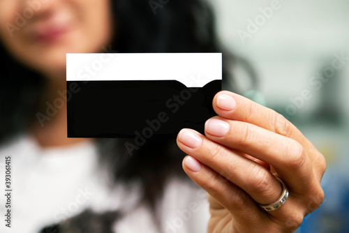 business card in hand close-up