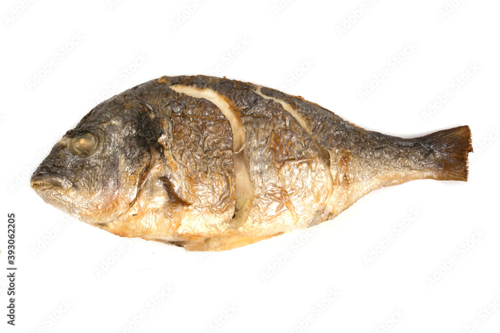 fried dorado fish on a poor background fried dorado fish on a poor background