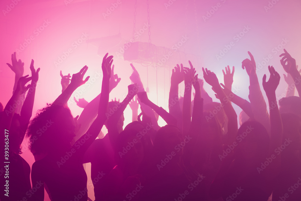 Photo of gathering careless dance have fun party raise hands wear trendy outfit modern club indoors