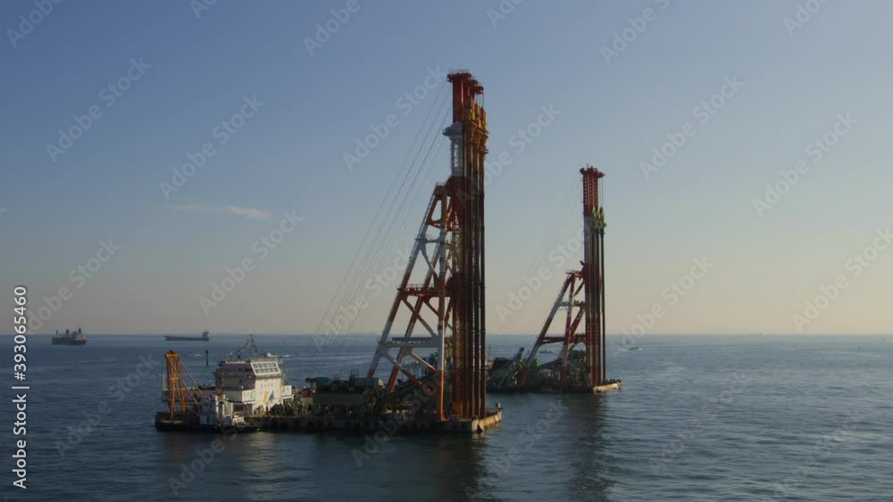 Yokohama, sand drain pile driving barge. A vessel for driving sand piles to apply preload to the soft seabed Yokohama, sand drain pile driving barge. A vessel for driving sand piles to apply preload to the soft seabed