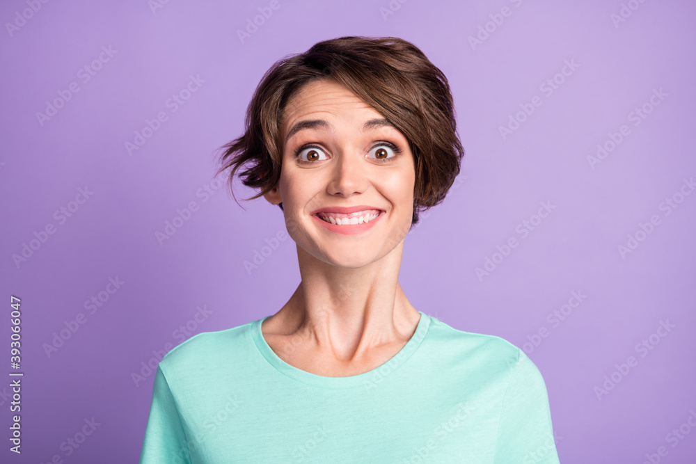 Fototapeta premium Close up portrait of adorable person smile staring camera turquoise outfit isolated on violet color background