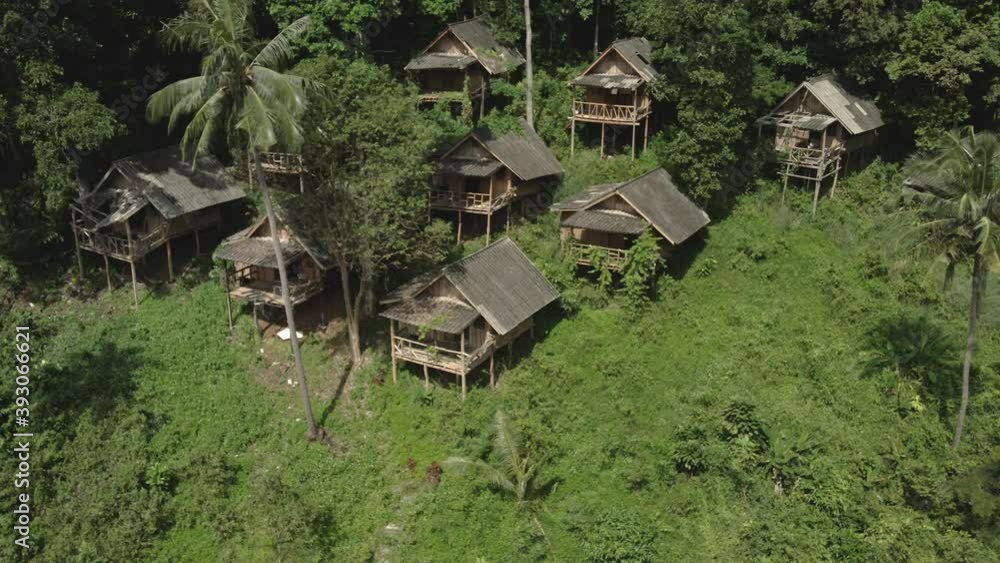 Aerial orbit run down empty Thai bungalows no tourists pandemic travel restrictions Aerial orbit run down empty Thai bungalows no tourists pandemic travel restrictions