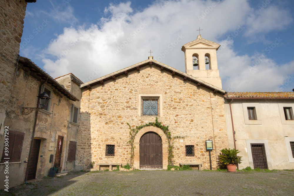 Church of the Holy of Sasso Cerveteri ,The 16th century church, With overlooks the square that paved with bricks arranged in an ear of wheat, situated at the foot of Monte Santo.