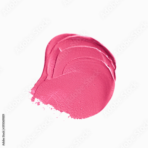 Pink lipstick texture stain isolated white background. Abstract art oil pink paint spot background.