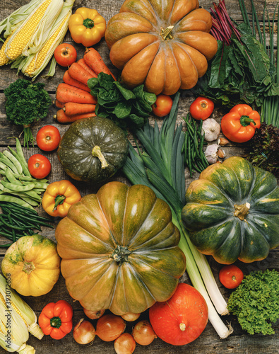 Beautiful arrengament of autumn vegetables on wooden table