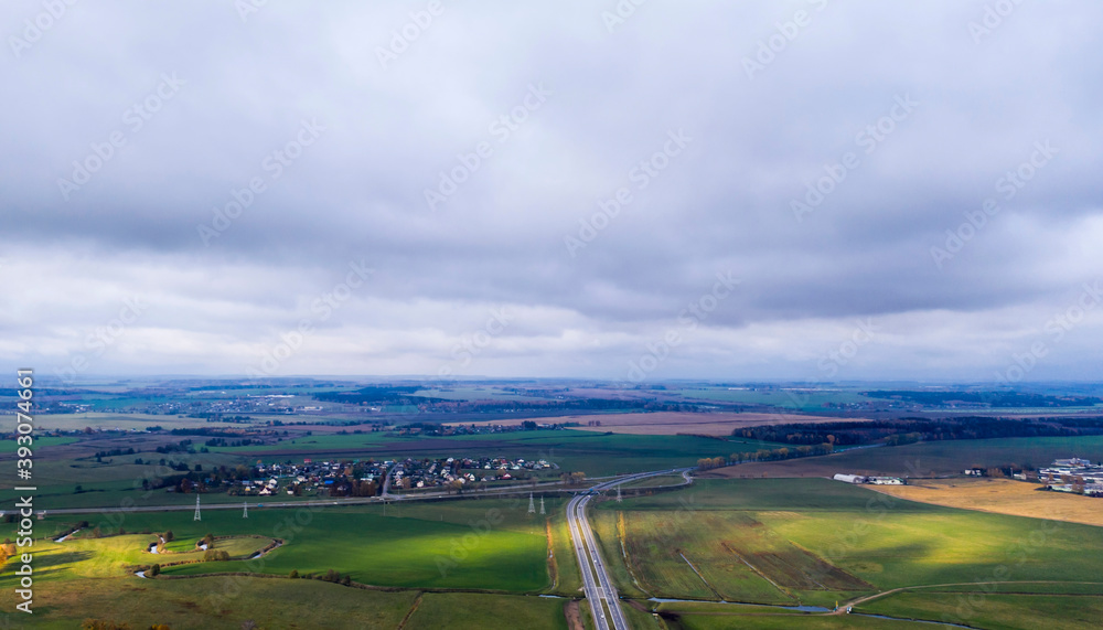 Aerial bird-eye view on freeway in autumn season