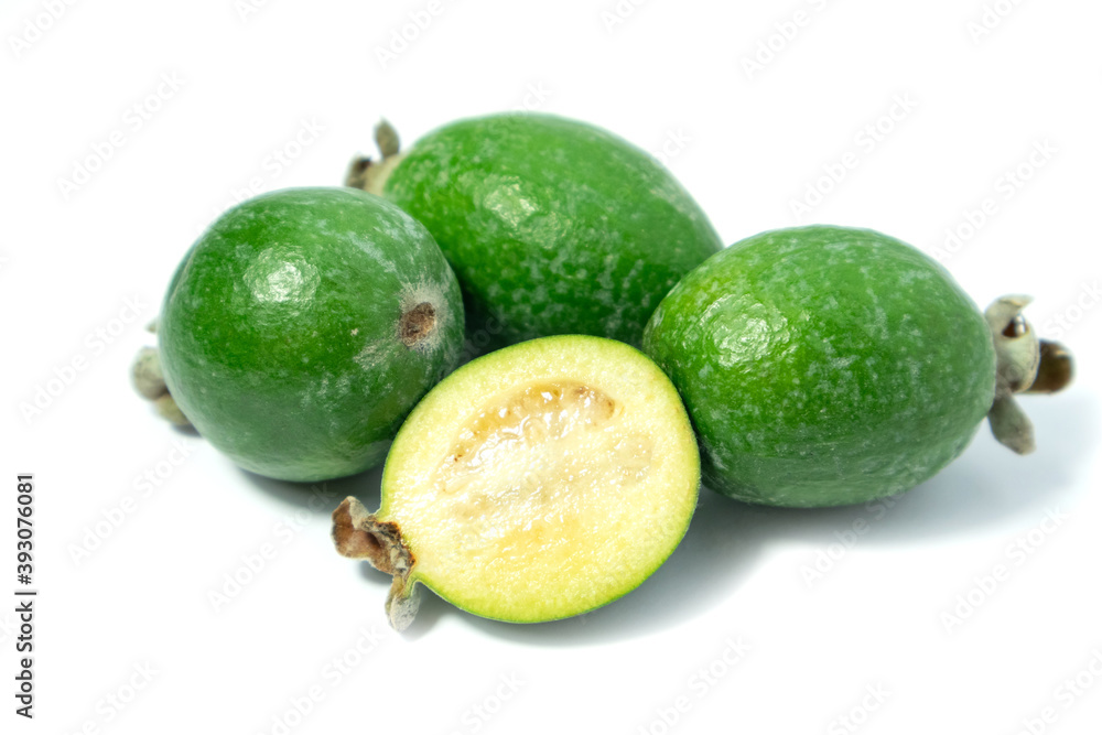 Feijoa fruits on white background. Tropical ripe feijoa fruits. Feijoa fruits on white background. Tropical ripe feijoa fruits.
