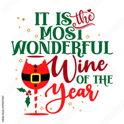 It is the most Wonderful Wine of the Year - Calligraphy phrase for Christmas. Hand drawn lettering for Xmas greetings cards, invitations. Good for t-shirt, mug, scrap booking, gift, printing press.