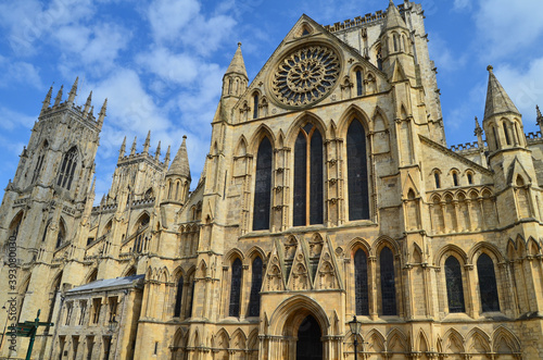 Vertical shot of the historical York Minster Cathedral in York, United Kingdom photo