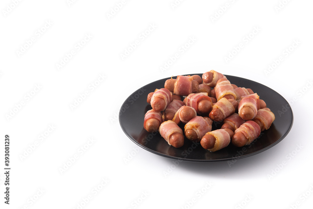 Pig in blankets. Sausages wrapped in smoked bacon isolated on white background Pig in blankets. Sausages wrapped in smoked bacon isolated on white background