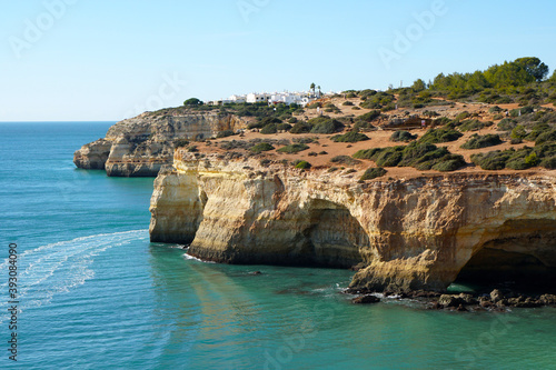 village of Benagil sitting on a cliff on south coast of the Algarve