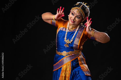 Kuchipudi dancer in shringar rasa getting dressed up	