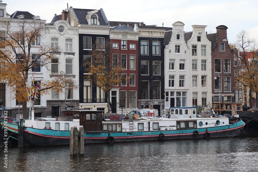 Canal Houses and Houseboat in Amsterdam