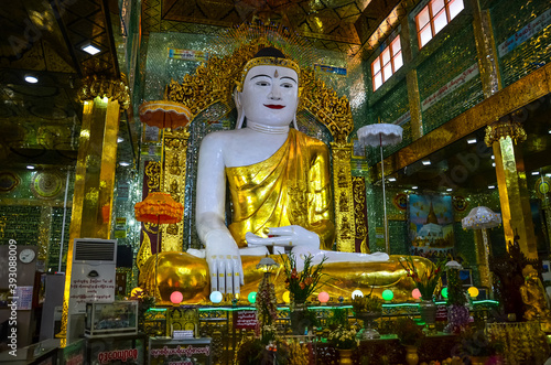 Shot of the big statue of Gautama Buddha in Ngar Htat Gyi Pagoda, Yangon, Myanmar photo