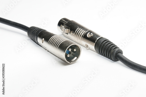 Audio cable with XLR connectors for microphones and professional audio equipment on a white background