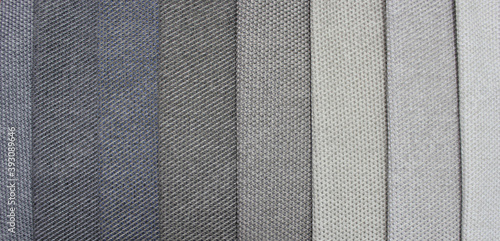 Samples of furniture fabric. Production of upholstered furniture, details. Close-up photos, selective focus.