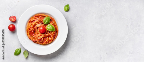 Classical spaghetti with tomato sauce on white background
