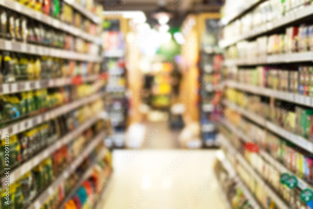 Grocery Store Aisle Abstract Blurred Background With Products On Shelves