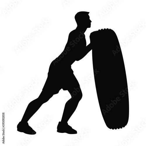 Healthy man with car wheel for exercise silhouette vector