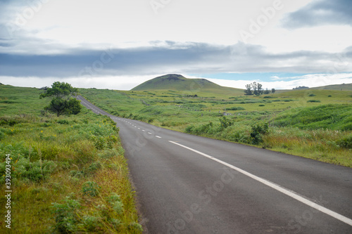 Straight and lonely road in the middle of Easter Island, Chile