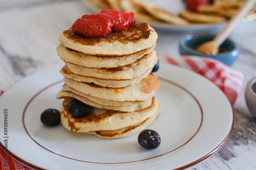 Delicious pancakes with blueberry and honey Delicious pancakes with blueberry and honey