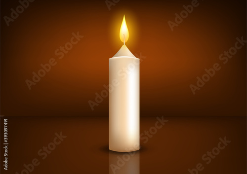 Realistic lighted candle background.