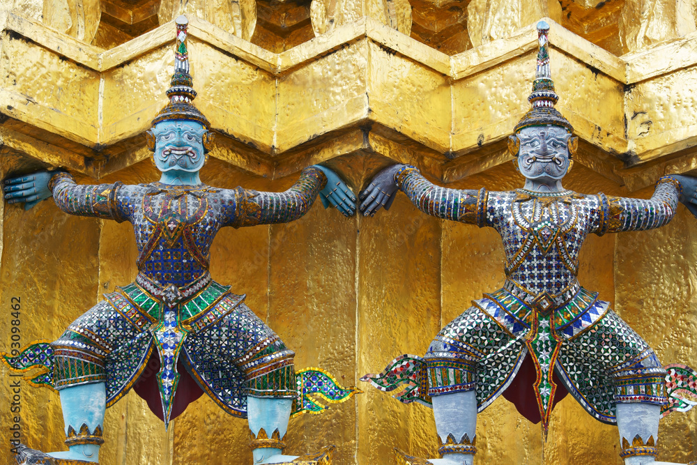 demon statue which support golden pagoda