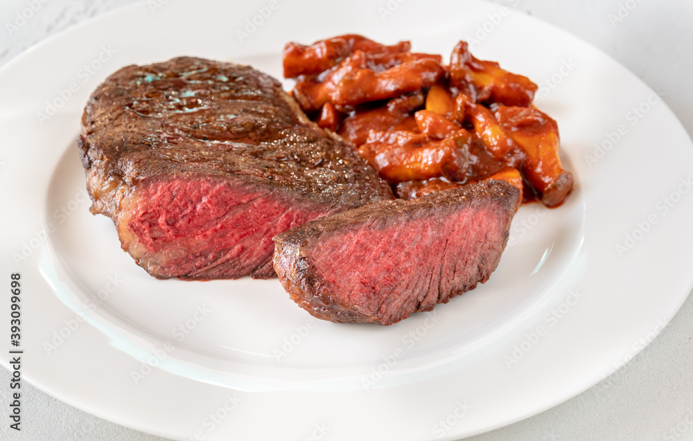 Steak rib eye with mushroom stew