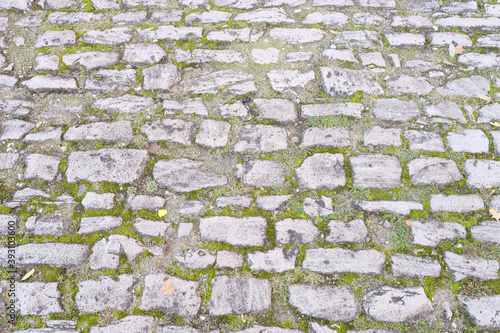 texture of the old stone road for the designer, rough gray background, concept of ancient European architecture, tourism, travel