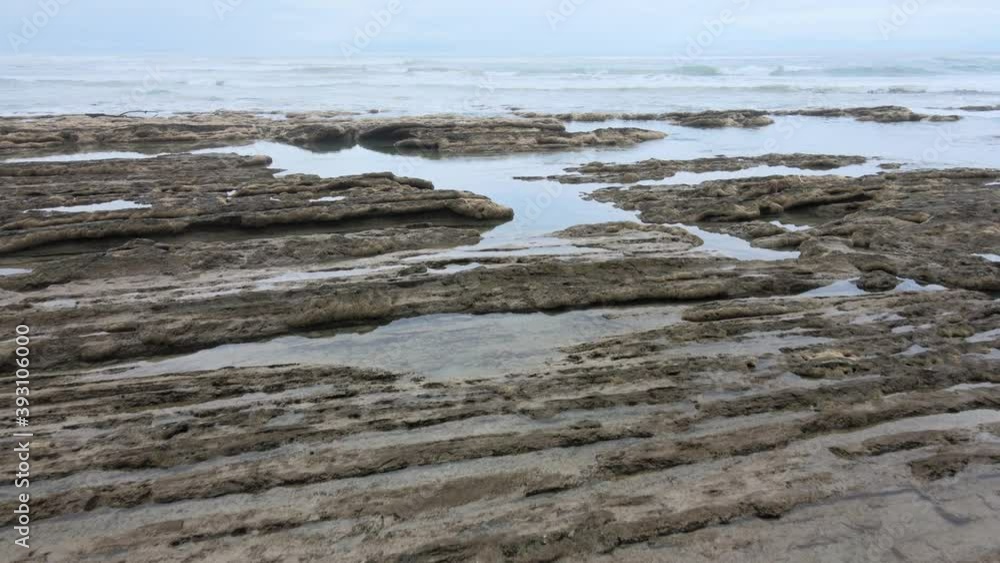 Lush Tropical Beach Paradise with blue water, great waves and rock formations in Malpais / Santa Teresa, Nicoya Peninsula Costa Rica Lush Tropical Beach Paradise with blue water, great waves and rock formations in Malpais / Santa Teresa, Nicoya Peninsula Costa Rica
