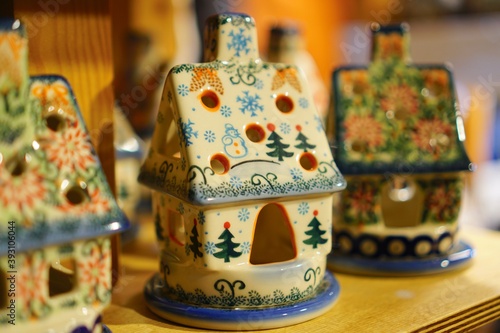 Decorative porcelain figures at the Cracow Christmas market. Traditional market with handmade souvenirs, Krakow, Poland.   